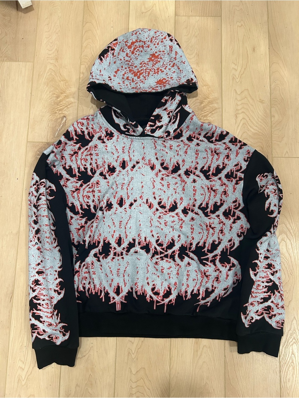 Men's Black Hoodie with Red and White Allover Graphic Print